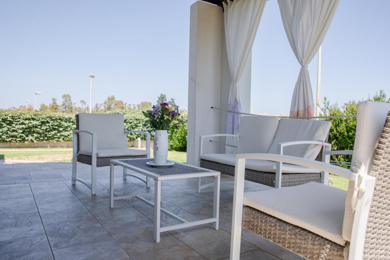 Le Residenze Di Baia Sant'Anna Villa Tanaunella Buitenkant foto