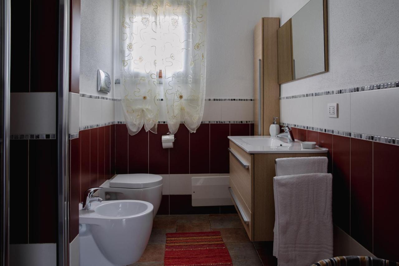 Le Residenze Di Baia Sant'Anna Villa Tanaunella Buitenkant foto